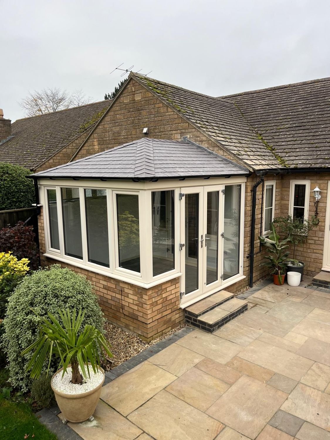Conservatory on a bungalow with a new tiled roof