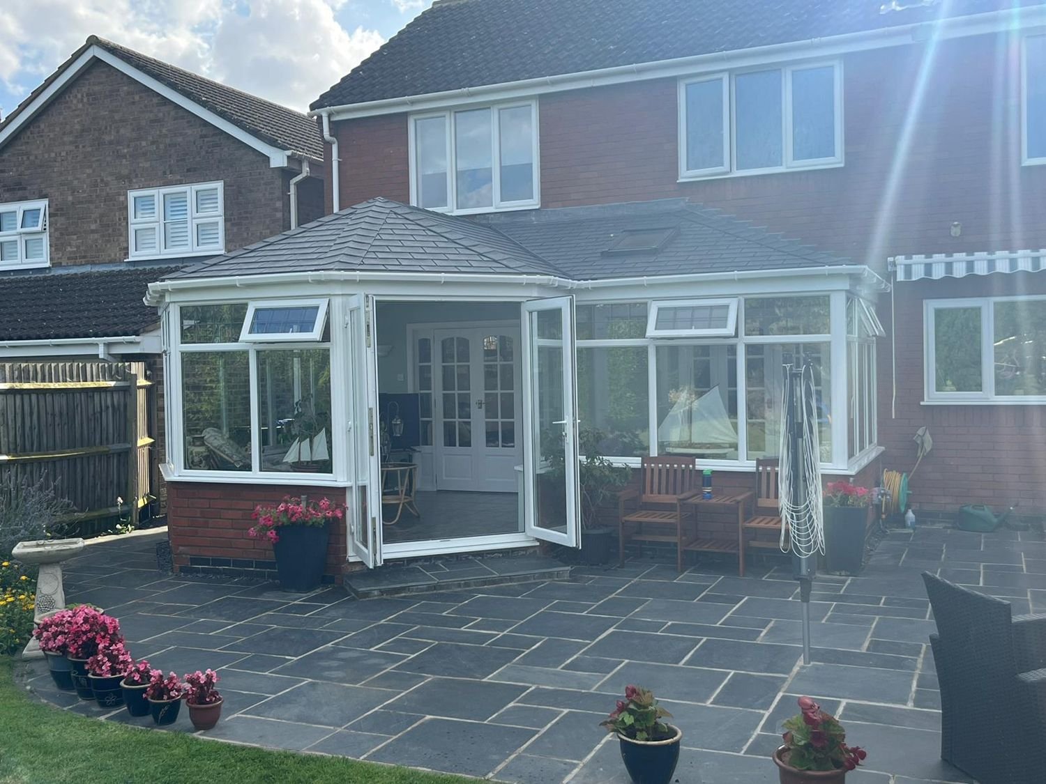 Finished tiled roof on a red brick house